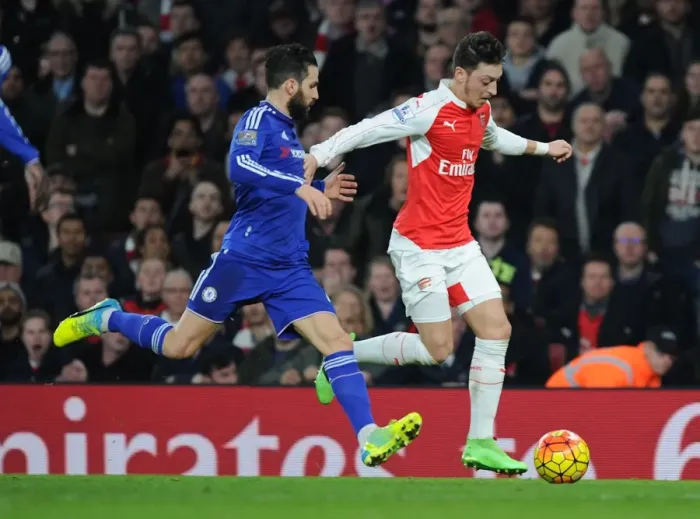 Framed Print : Clash of the Titans: Ozil vs. Fabregas - Arsenal vs. Chelsea Showdown