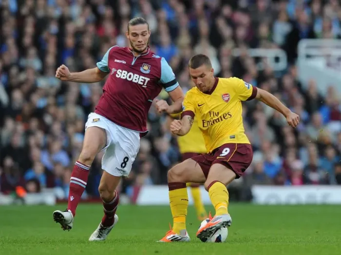 Framed Print : Clash of Titans: Podolski vs. Carroll - West Ham United vs. Arsenal, Premier League 2012-13