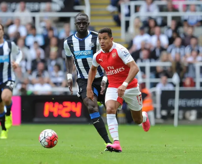 Framed Print : Clash of Titans: Sanchez vs. Sissoko - Arsenal's Alexis Sanchez Goes Head-to-Head with Newcastle's Moussa Sissoko, Premier League 2015-16