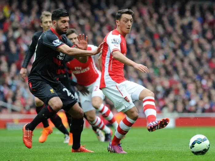 Framed Print : Clash of Titans: Sanchez vs. Can - Arsenal vs. Liverpool: A Battle of Midfield Masters