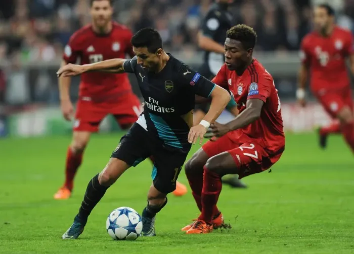 Framed Print : Clash of Titans: Sanchez vs. Coman - Bayern Munich vs. Arsenal, UEFA Champions League