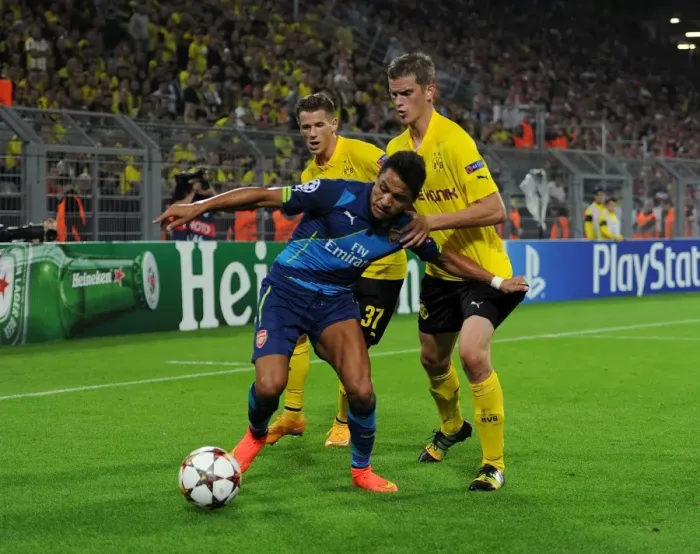Framed Print : Clash of Titans: Sanchez vs. Dortmund's Defense - Borussia Dortmund vs. Arsenal, UEFA Champions League Framed Print : Clash of Titans: Sanchez vs. Dortmund's Defense - Borussia Dortmund vs. Arsenal, UEFA Champions League