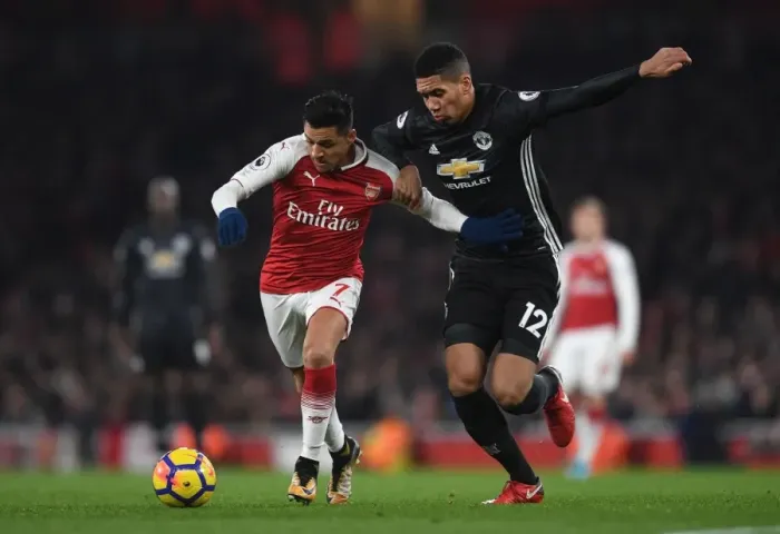 Framed Print : Clash of Titans: Sanchez vs Smalling - Arsenal vs Manchester United, Premier League 2017-18 Framed Print : Clash of Titans: Sanchez vs Smalling - Arsenal vs Manchester United, Premier League 2017-18
