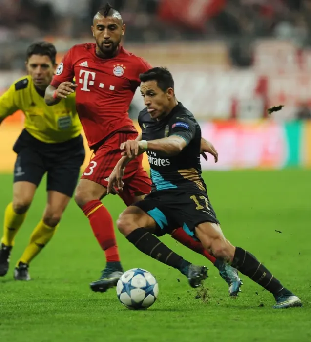Framed Print : Clash of Titans: Sanchez vs. Vidal - Bayern Munich vs. Arsenal, UEFA Champions League 2015-16: A Battle at Allianz Arena