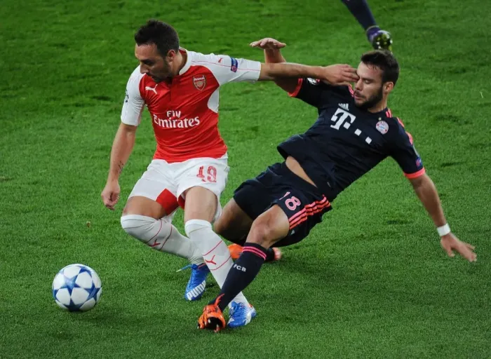 Framed Print : Clash of Titans: Santi Cazorla vs. Juan Bernat - Arsenal vs. Bayern Munich, UEFA Champions League