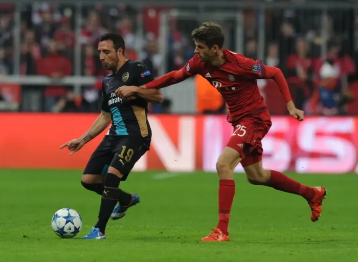 Framed Print : Clash of Titans: Santi Cazorla vs Thomas Muller - Battle at the Allianz Arena Framed Print : Clash of Titans: Santi Cazorla vs Thomas Muller - Battle at the Allianz Arena
