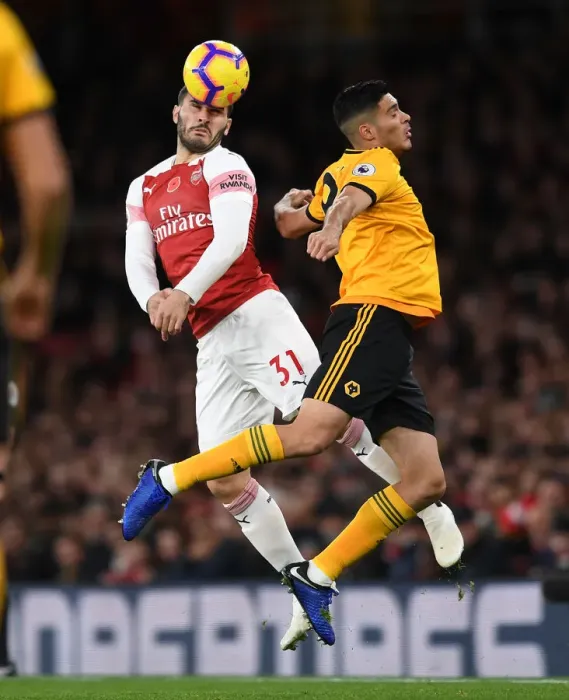 Framed Print : Clash of Titans: Sead Kolasinac vs. Raul Jimenez - Arsenal vs. Wolverhampton Wanderers, Premier League 2018-19 Framed Print : Clash of Titans: Sead Kolasinac vs. Raul Jimenez - Arsenal vs. Wolverhampton Wanderers, Premier League 2018-19