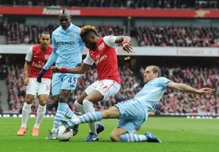 Framed Print : Clash of Titans: Song vs. Balotelli & Zabaleta - Arsenal vs. Manchester City, Premier League Framed Print : Clash of Titans: Song vs. Balotelli & Zabaleta - Arsenal vs. Manchester City, Premier League