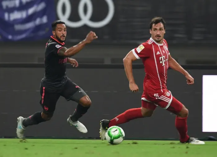 Framed Print : Clash of Titans: Theo Walcott vs. Mats Hummels - Bayern Munich vs. Arsenal Pre-Season Friendly Framed Print : Clash of Titans: Theo Walcott vs. Mats Hummels - Bayern Munich vs. Arsenal Pre-Season Friendly