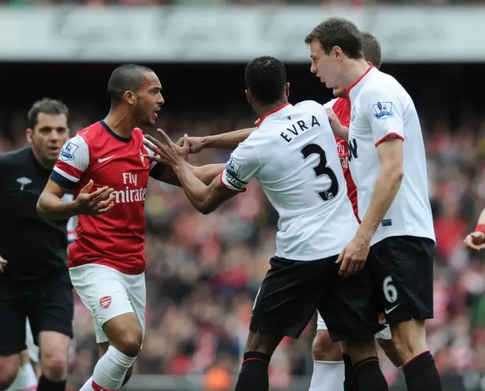 Framed Print : Clash of Titans: Walcott vs. Evra - Arsenal vs. Manchester United (2012-13)
