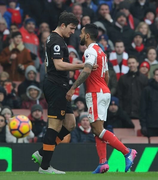 Clash of the Titans: Walcott vs Maguire in Arsenal's Battle with Hull City