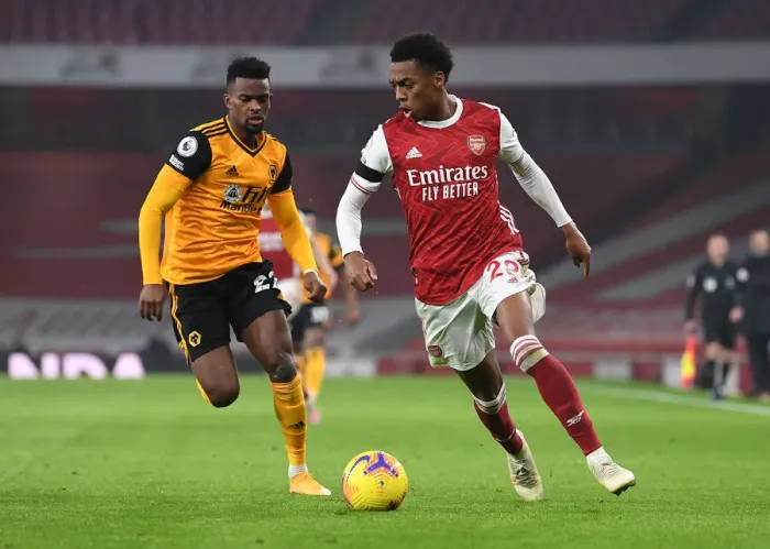 Framed Print : Clash of Titans: Willock vs. Semedo - Arsenal vs. Wolverhampton Wanderers (Premier League 2020-21) - Empty Emirates Stadium Battle