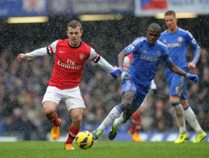 Framed Print : Clash of Titans: Wilshere vs. Ramires - A Premier League Showdown