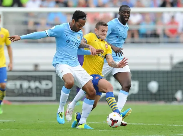 Framed Print : Clash of Titans: Wilshere vs. Toure & Lescott - Arsenal vs. Manchester City Pre-Season 2013-14 Framed Print : Clash of Titans: Wilshere vs. Toure & Lescott - Arsenal vs. Manchester City Pre-Season 2013-14