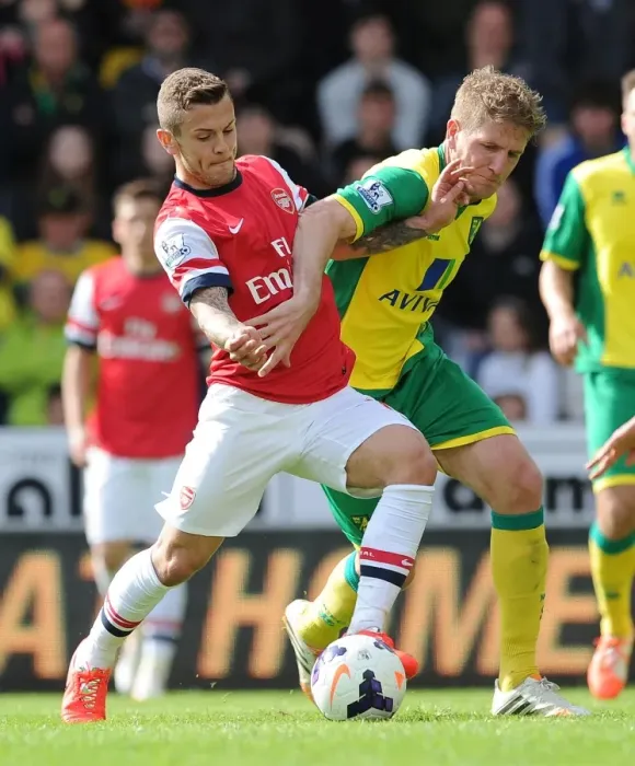 Framed Print : Clash of Titans: Wilshere vs Turner - Norwich City vs Arsenal, Premier League 2013-14