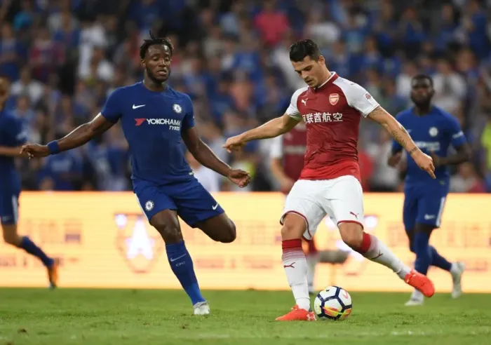 Framed Print : Clash of Titans: Xhaka vs Batshuayi in Arsenal's Pre-Season Battle with Chelsea