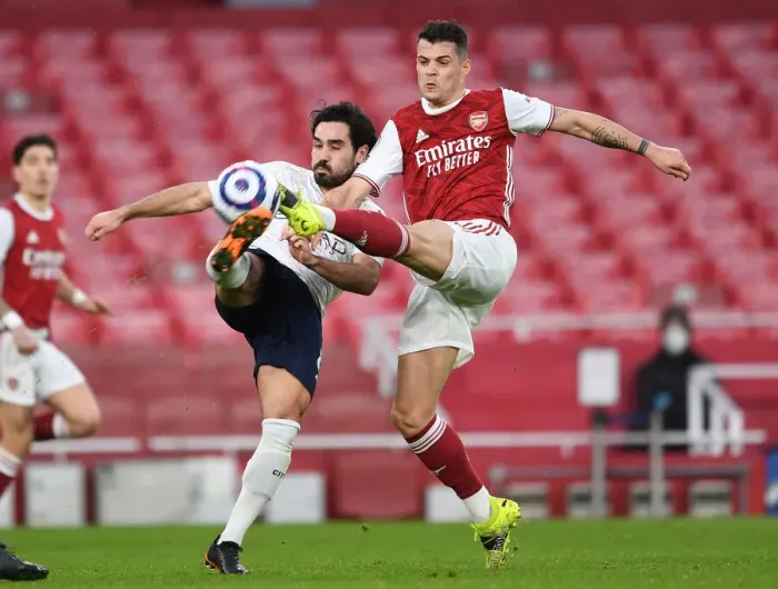 Framed Print : Clash of Titans: Xhaka vs. Gundogan - Arsenal vs. Manchester City, Premier League 2021 (Behind Closed Doors)