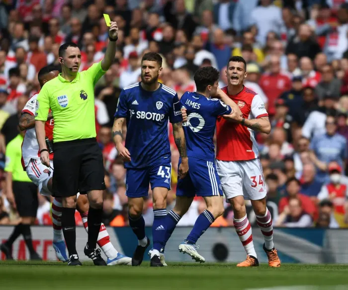 Framed Print : Clash of Titans: Xhaka vs. Mateusz in Arsenal's Battle Against Leeds United (Arsenal v Leeds United 2021-22)