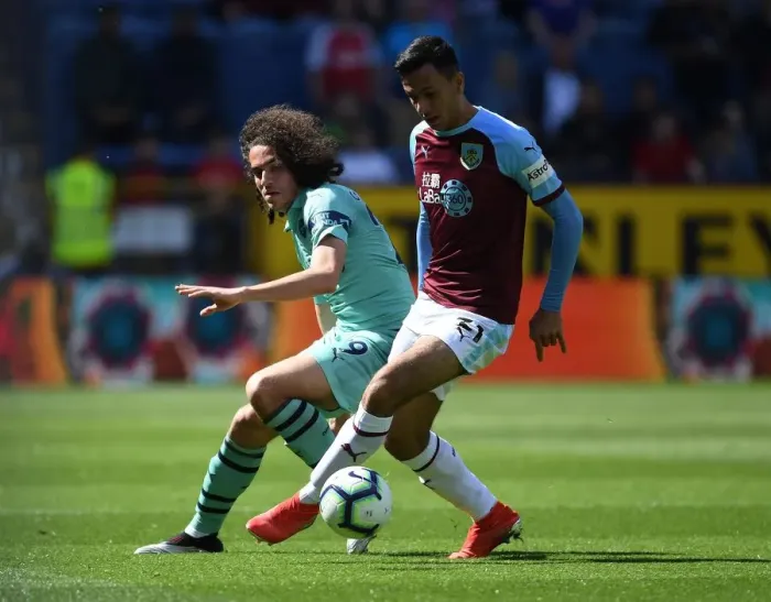 Framed Print : Clash at Turf Moor: Guendouzi vs. McNeil in Intense Burnley vs. Arsenal Premier League Encounter