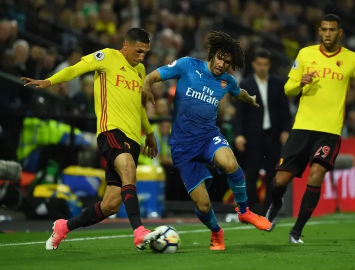 Framed Print : Clash at Vicarage Road: Mohamed Elneny vs Jose Holebas - A Premier League Battle Framed Print : Clash at Vicarage Road: Mohamed Elneny vs Jose Holebas - A Premier League Battle