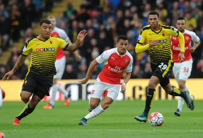 Framed Print : Clash at Vicarage Road: Sanchez vs Capoue and Deeney - Arsenal's Star Forward Tangles with Watford Duo