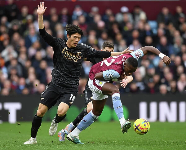 Clash at Villa Park: Arsenal's Tomiyasu Faces Off Against Aston Villa's Duran Palacios