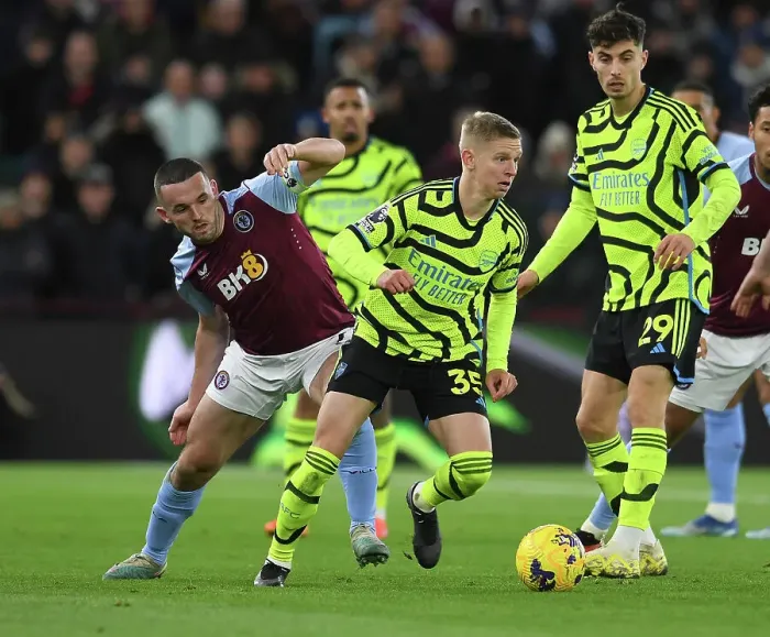 Framed Print : Clash at Villa Park: Arsenal's Zinchenko Faces Off Against McGinn Framed Print : Clash at Villa Park: Arsenal's Zinchenko Faces Off Against McGinn