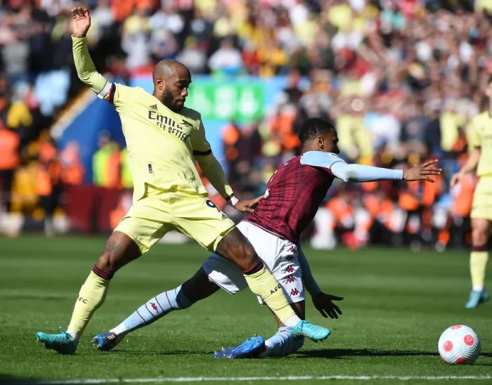 Framed Print : Clash at Villa Park: Lacazette Challenges Konsa in Premier League Showdown Framed Print : Clash at Villa Park: Lacazette Challenges Konsa in Premier League Showdown