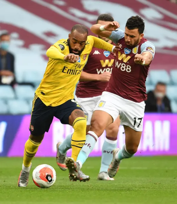 Framed Print : Clash at Villa Park: Lacazette vs. Trezeguet in Premier League Showdown (Aston Villa vs. Arsenal, 2019-20) Framed Print : Clash at Villa Park: Lacazette vs. Trezeguet in Premier League Showdown (Aston Villa vs. Arsenal, 2019-20)