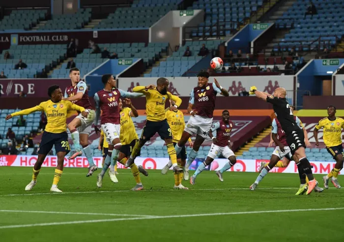 Framed Print : Clash at Villa Park: Lacazette vs. Mings in Premier League Showdown (Aston Villa vs. Arsenal, 2019-20)