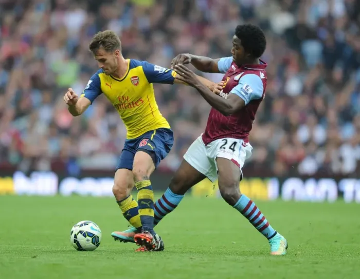 Framed Print : Clash at Villa Park: Ramsey vs. Sanchez, Premier League Showdown (2014) Framed Print : Clash at Villa Park: Ramsey vs. Sanchez, Premier League Showdown (2014)