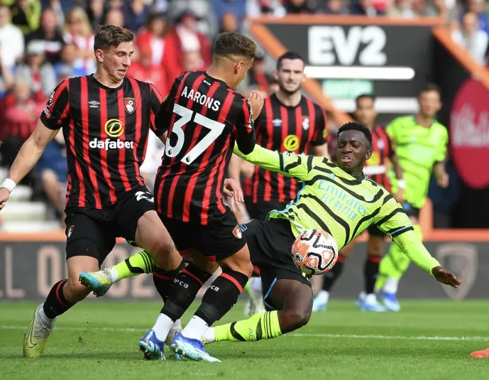 Framed Print : Clash at the Vitality: Arsenal's Nketiah Faces Off Against Aarons in Premier League Showdown (AFC Bournemouth vs Arsenal, 2023-24)