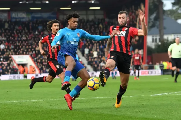 Framed Print : Clash at Vitality: Iwobi vs Cook in AFC Bournemouth vs Arsenal Framed Print : Clash at Vitality: Iwobi vs Cook in AFC Bournemouth vs Arsenal