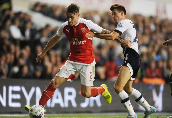 Framed Print : Clash at White Hart Lane: Debuchy vs. Carroll - Arsenal vs. Tottenham in the Capital One Cup Framed Print : Clash at White Hart Lane: Debuchy vs. Carroll - Arsenal vs. Tottenham in the Capital One Cup