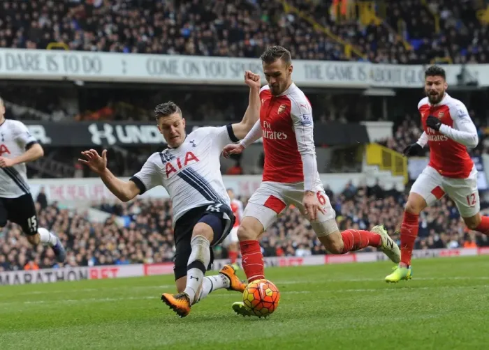 Framed Print : Clash at White Hart Lane: Ramsey vs. Wimmer - A Football Battle