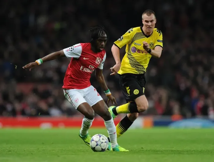 Framed Print : Clash of Wings: Gervinho vs. Grosskreutz in Arsenal vs. Borussia Dortmund UEFA Champions League Framed Print : Clash of Wings: Gervinho vs. Grosskreutz in Arsenal vs. Borussia Dortmund UEFA Champions League