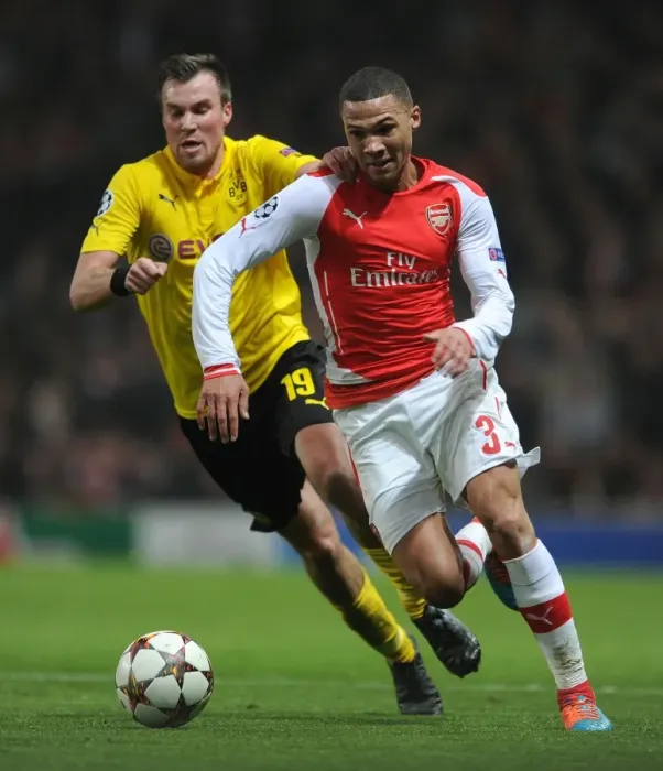Framed Print : Clash of Wings: Gibbs vs. Grosskreutz - Arsenal vs. Borussia Dortmund UEFA Champions League Showdown Framed Print : Clash of Wings: Gibbs vs. Grosskreutz - Arsenal vs. Borussia Dortmund UEFA Champions League Showdown