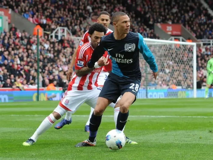 Framed Print : Clash of Wings: Gibbs vs Pennant in Stoke City vs Arsenal Framed Print : Clash of Wings: Gibbs vs Pennant in Stoke City vs Arsenal
