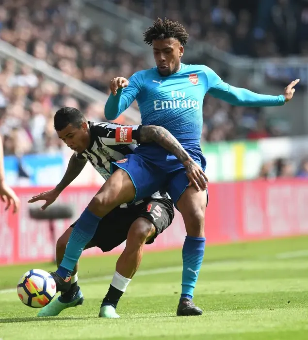 Framed Print : Clash of Wings: Iwobi vs Kenedy in Newcastle United vs Arsenal Premier League Showdown