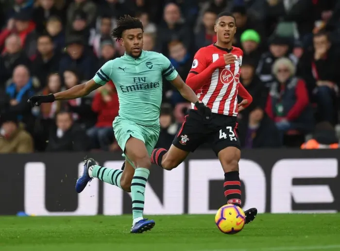 Framed Print : Clash of Wings: Iwobi vs Valery in Southampton vs Arsenal Premier League Showdown Framed Print : Clash of Wings: Iwobi vs Valery in Southampton vs Arsenal Premier League Showdown