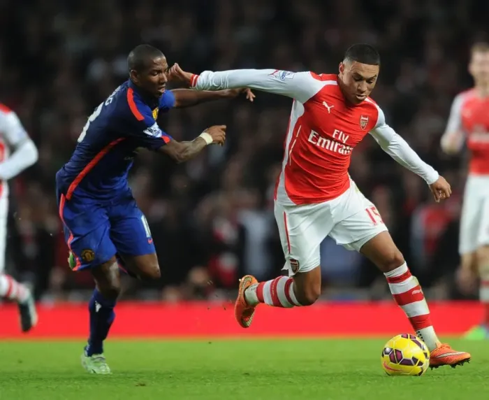 Framed Print : Clash of Wings: Oxlade-Chamberlain vs. Young - Arsenal vs. Manchester United, Premier League, 2014