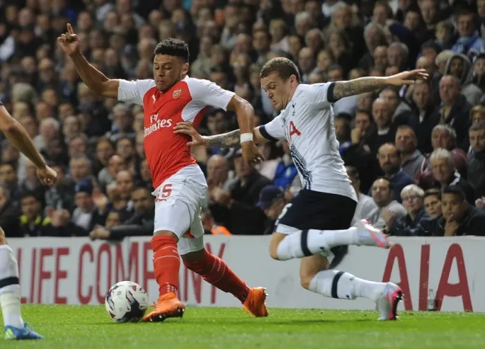 Framed Print : Clash of Wings: Oxlade-Chamberlain vs. Trippier in the Intense Battle of the Capital One Cup Framed Print : Clash of Wings: Oxlade-Chamberlain vs. Trippier in the Intense Battle of the Capital One Cup