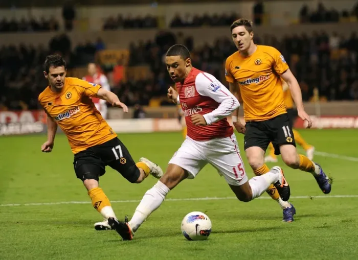 Framed Print : Clash of Wings: Oxlade-Chamberlain vs. Jarvis & Ward (Wolverhampton Wanderers vs. Arsenal, 2012) Framed Print : Clash of Wings: Oxlade-Chamberlain vs. Jarvis & Ward (Wolverhampton Wanderers vs. Arsenal, 2012)