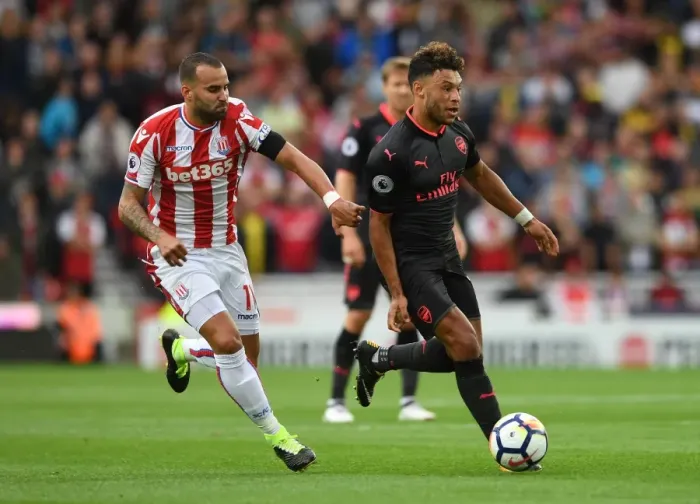 Framed Print : Clash of the Wings: Oxlade-Chamberlain vs Jese at Bet365 Stadium (Stoke City vs Arsenal 2017-18) Framed Print : Clash of the Wings: Oxlade-Chamberlain vs Jese at Bet365 Stadium (Stoke City vs Arsenal 2017-18)