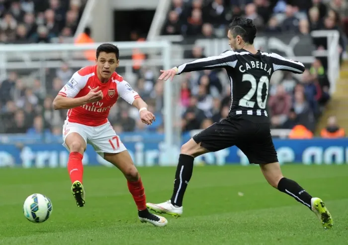 Framed Print : Clash of Wings: Sanchez vs. Cabella in Newcastle United vs. Arsenal