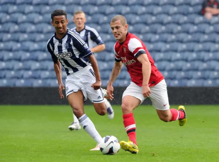 Framed Print : Clash of the Young Prodigies: Jack Wilshere vs Mani O'Sullivan in Arsenal's U21 Triumph over West Bromwich Albion Framed Print : Clash of the Young Prodigies: Jack Wilshere vs Mani O'Sullivan in Arsenal's U21 Triumph over West Bromwich Albion