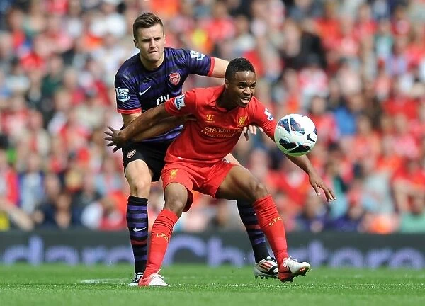 Clash of Young Stars: Jenkinson vs. Sterling - Premier League Battle at Anfield (2012-13)