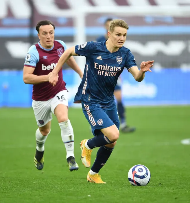 Framed Print : Behind Closed Doors: Martin Odegaard Outsmarts Noble in Arsenal's Triumph over West Ham, Premier League 2021 Framed Print : Behind Closed Doors: Martin Odegaard Outsmarts Noble in Arsenal's Triumph over West Ham, Premier League 2021
