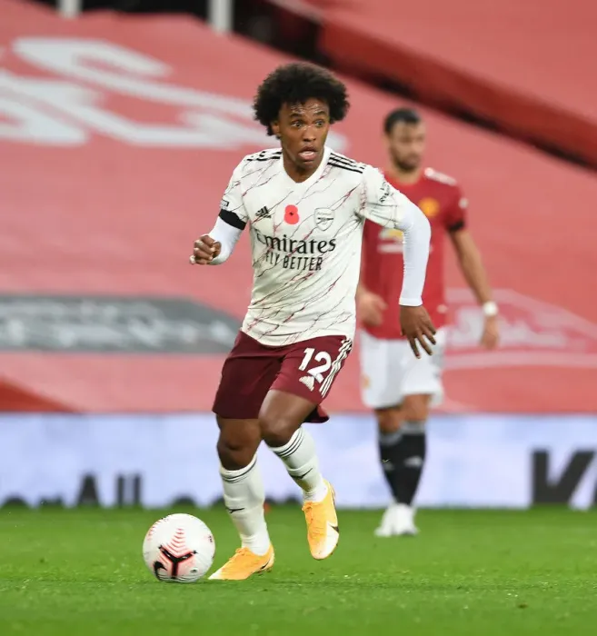 Framed Print : Behind Closed Doors: Willian at Empty Old Trafford - Manchester United vs Arsenal (2020-21) Framed Print : Behind Closed Doors: Willian at Empty Old Trafford - Manchester United vs Arsenal (2020-21)