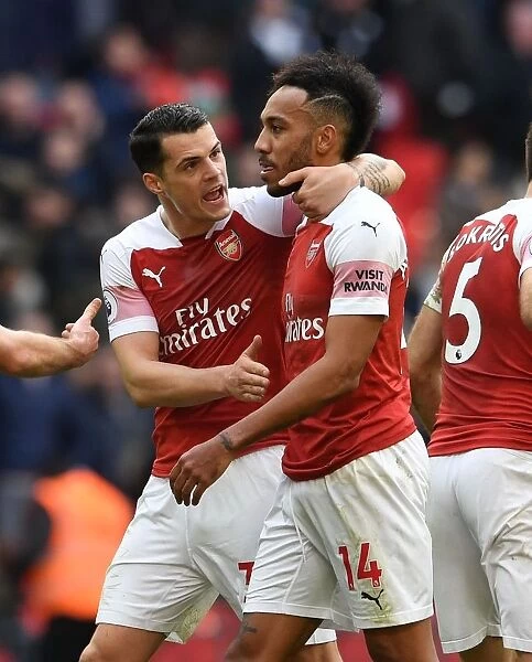 Consoling Aubameyang: Xhaka's Emotional Moment after Arsenal's Loss to Tottenham